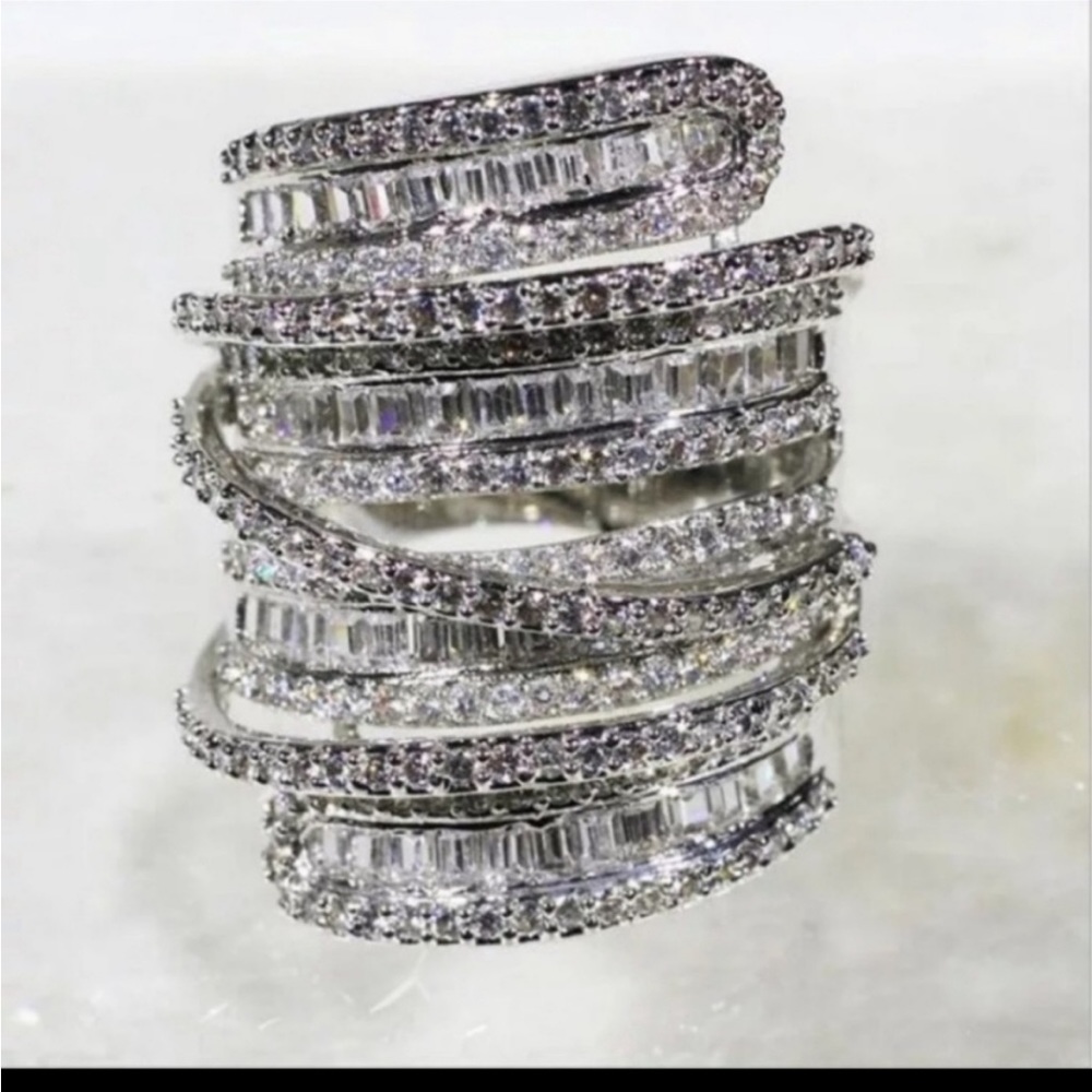 Beautiful sterling silver plated, stimulated diamond ring size 10. NWOT
